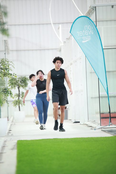 Members walking off the court at The Social Compound